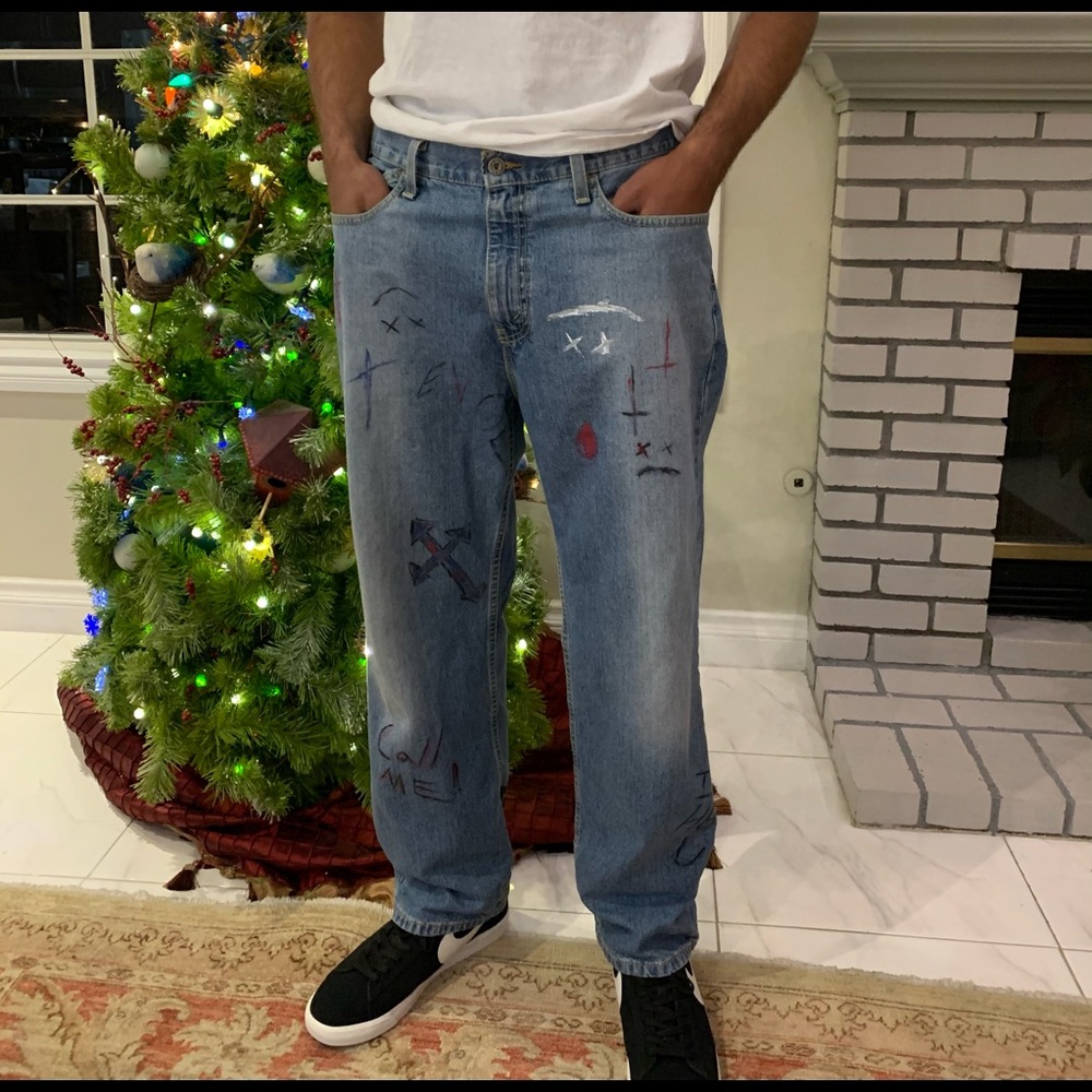 Baggy custom painted Levi silver tab jeans.32L 32W